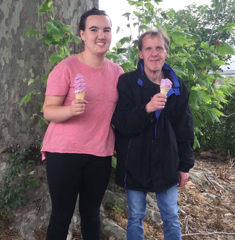 male and female holding ice creams