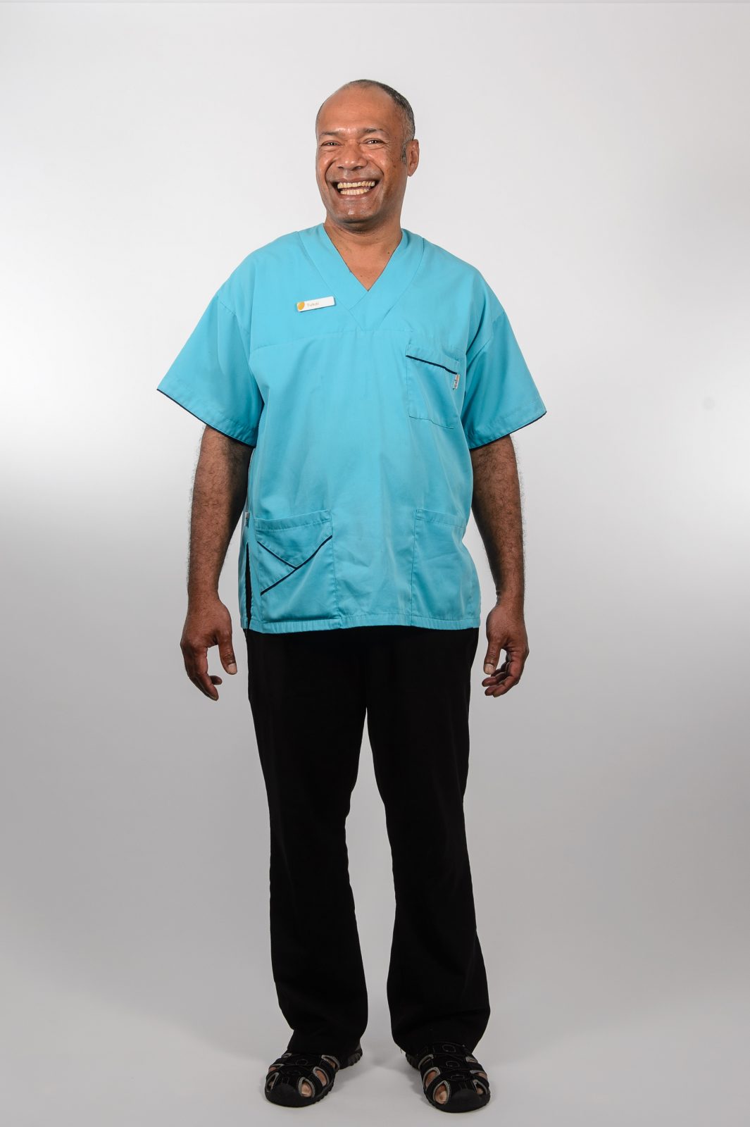 Male aged care worker smiling