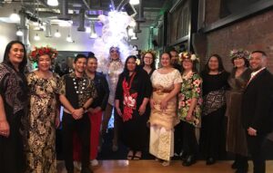 a group of Pacific people dressed up at an evening function